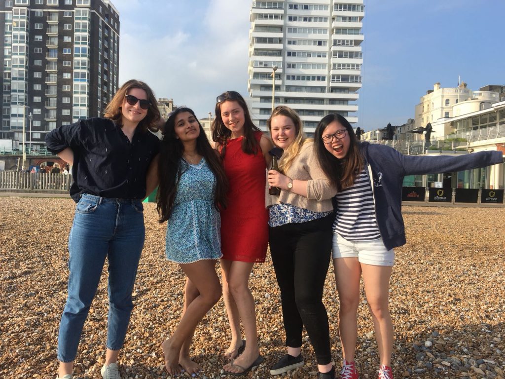 Thivya and her friends on Brighton beach