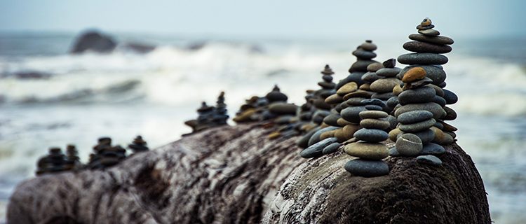 Stacked pebbles near the sea
