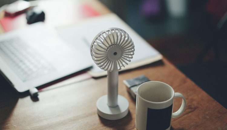 A mini-fan on a desk