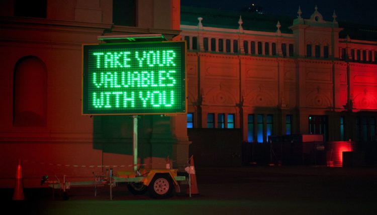 Take your valuables with you sign