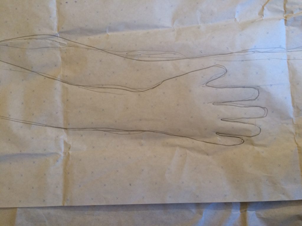 Hand outline in paper