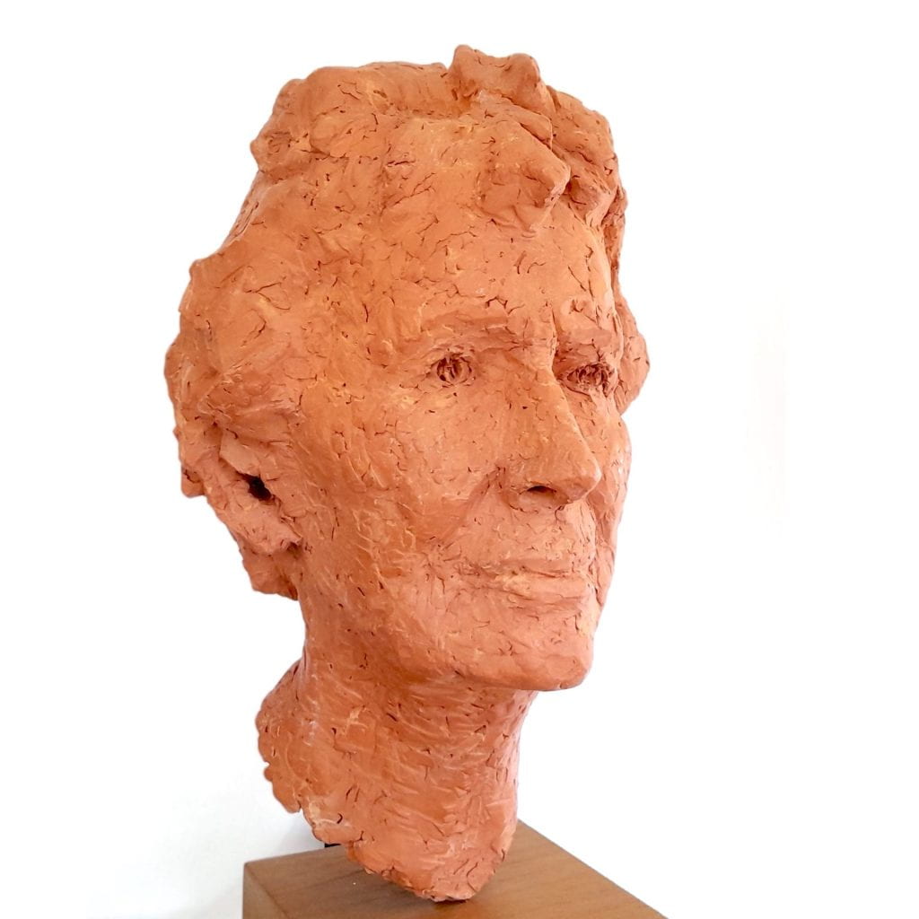a head sculpture by Jon